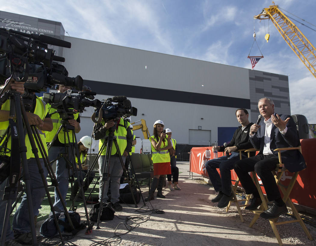 Steve Hill Las Vegas Convention and Visitors Authority CEO and president, right, speaks during ...