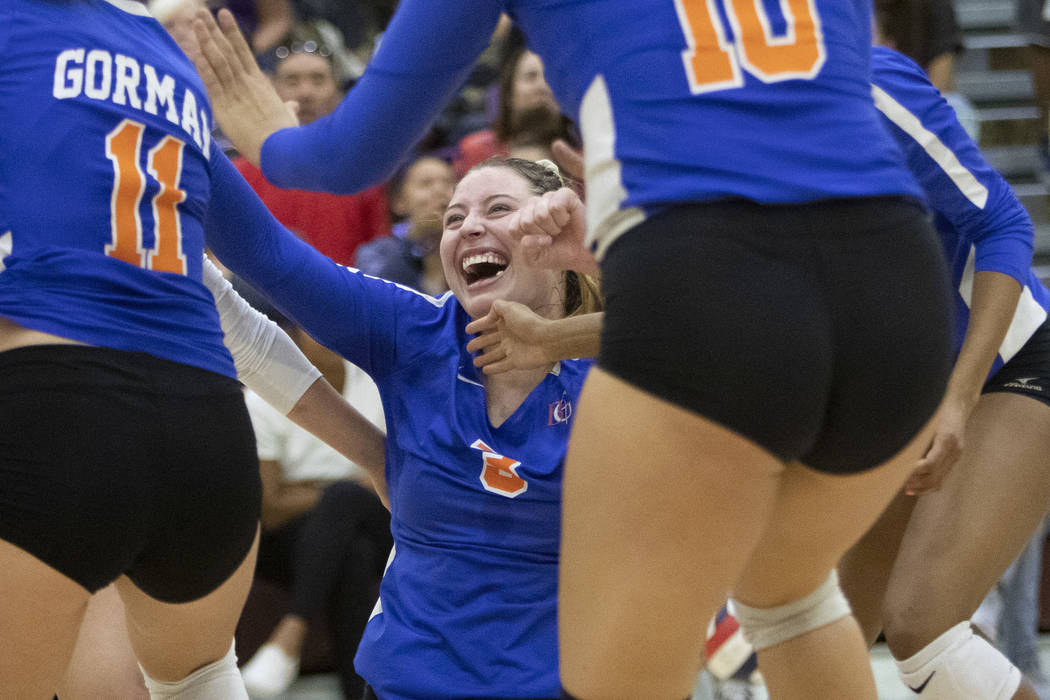 Bishop Gorman's Tommi Stockham (3) celebrates a successful kill during the match against Durang ...