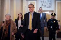 Mark Sandy, a career employee in the White House Office of Management and Budget, arrives at th ...