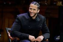 In this Oct. 11, 2018, file photo, former NFL football quarterback Colin Kaepernick smiles on s ...