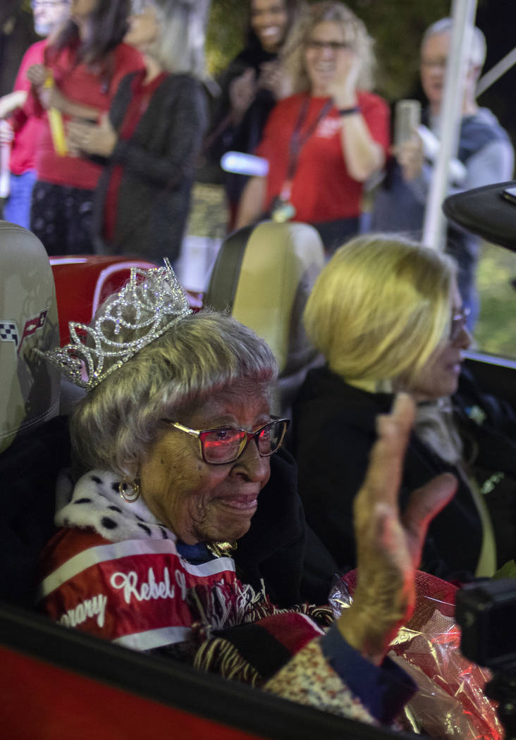 Audrey James, 105, rides through the UNLV homecoming parade as honorary homecoming queen on Fri ...
