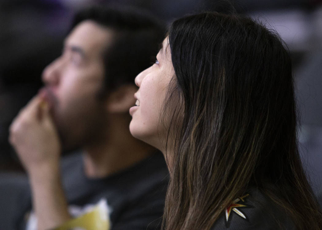 Eva Mar, right, and her brother Daniel Mar, left, watch as "Valiant," a documentary a ...