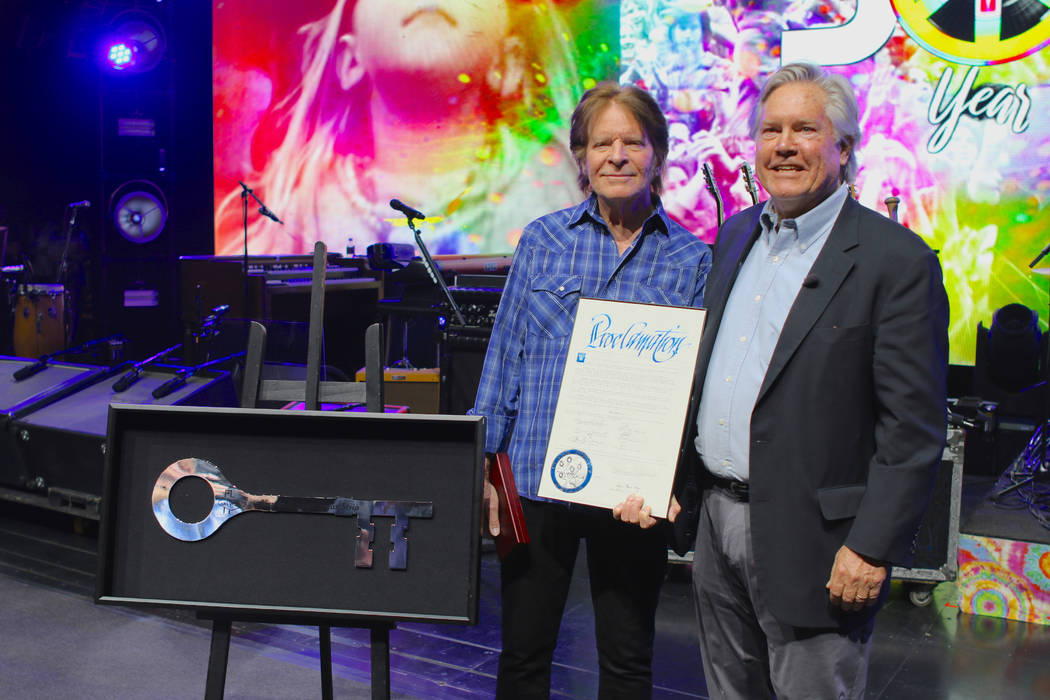Rock legend John Fogerty and Clark County Commissioner Tick Segerblom are shown at Encore Theat ...