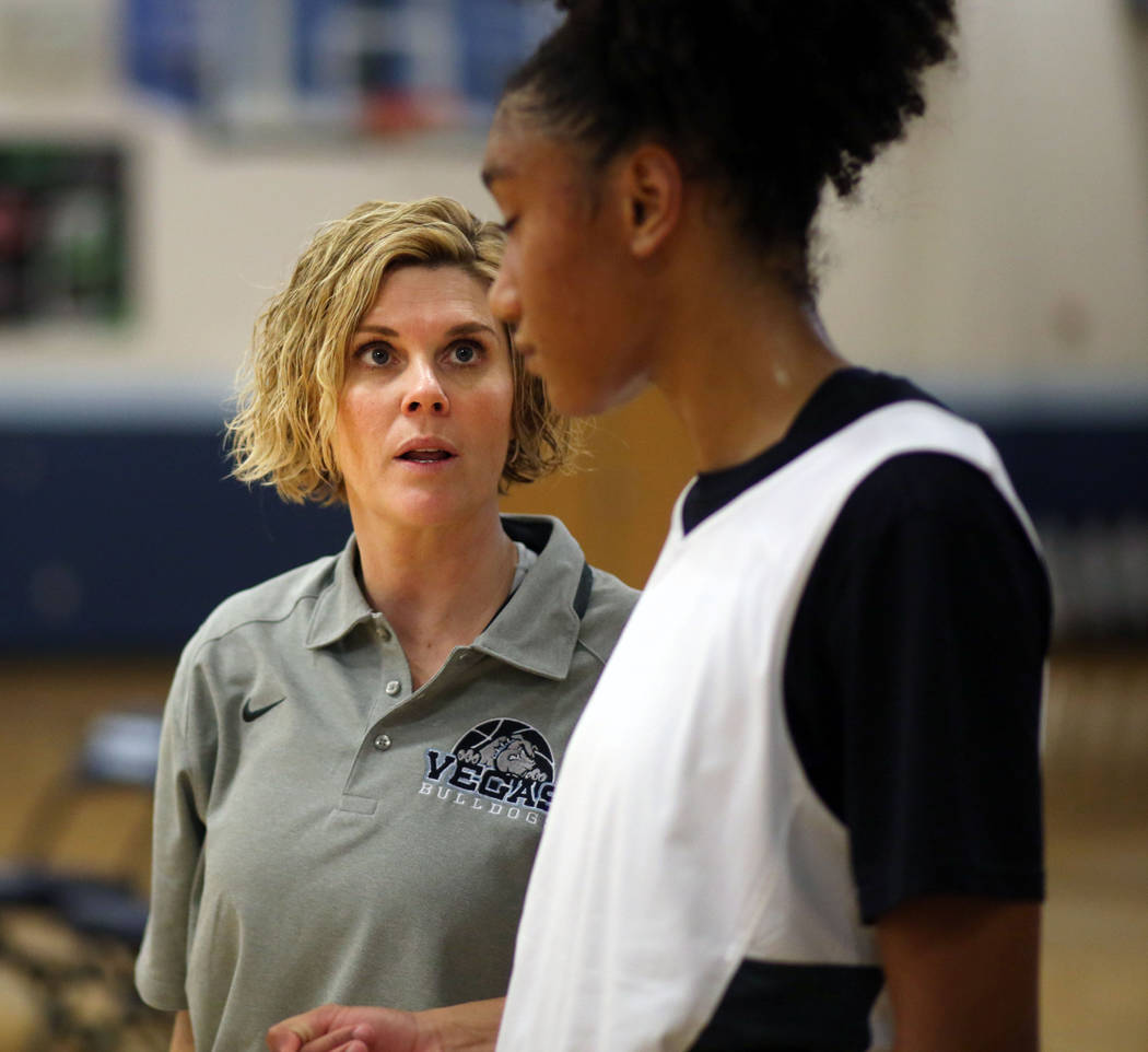 Assistant coach Katie Lutman, left, speaks to senior Aishah Brown during practice drills at Cen ...