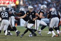 Oakland Raiders quarterback Derek Carr (4) during the second half of an NFL football game again ...