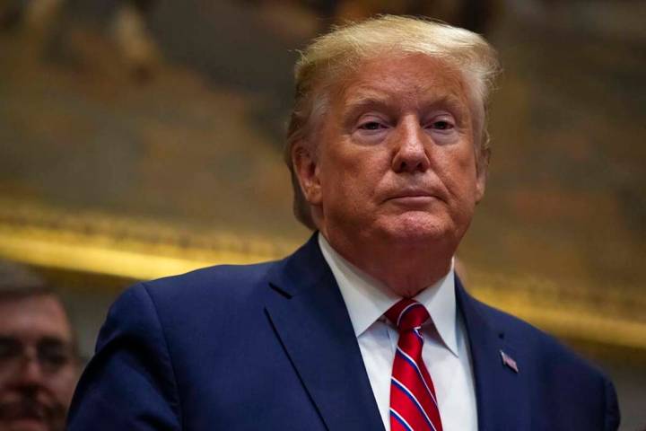 President Donald Trump pauses during an event on health care prices in the Roosevelt Room of th ...