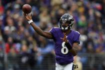 Baltimore Ravens quarterback Lamar Jackson throws a pass against the Houston Texans during the ...
