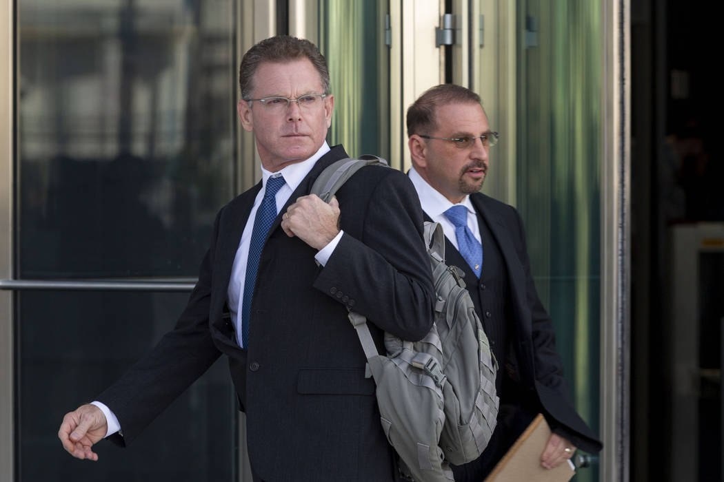 Douglas Haig, left, and his attorney Marc Victor leave the Lloyd George U.S. Courthouse after H ...