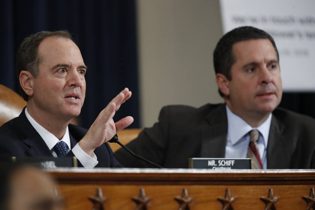 House Intelligence Committee Chairman Adam Schiff, D-Calif., left, and ranking member Rep. Devi ...