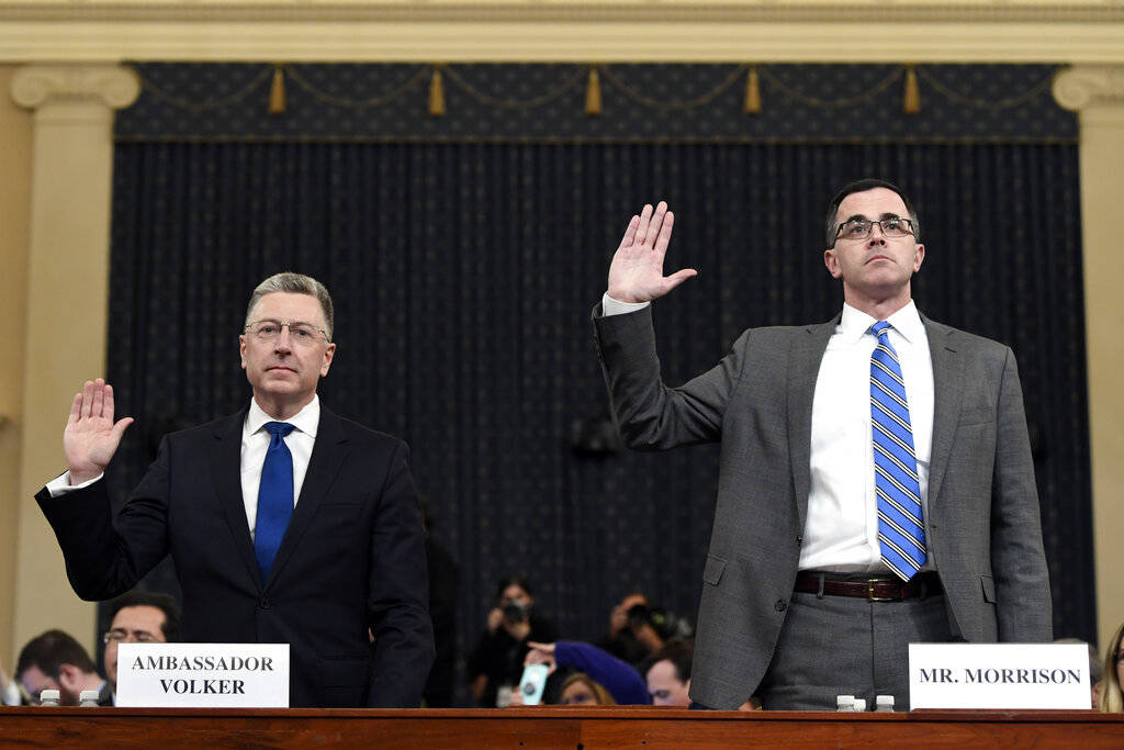 Ambassador Kurt Volker, left, former special envoy to Ukraine, and Tim Morrison, a former offic ...