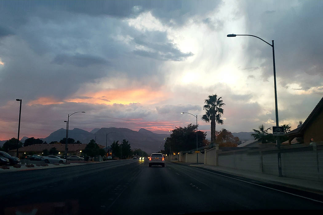 Ominous clouds rise above the northwest Las Vegas Valley near Lake Mead Boulevard and Cheyenne ...