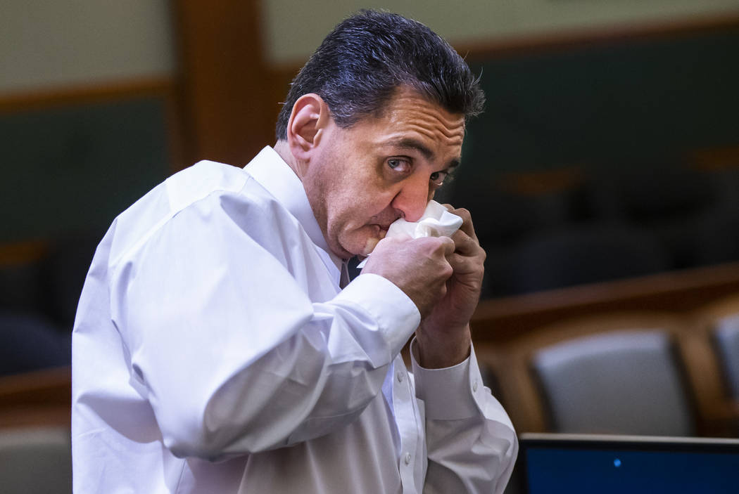 Manuel Mata wipes his face during a break in the penalty phase of his trial at Regional Justice ...