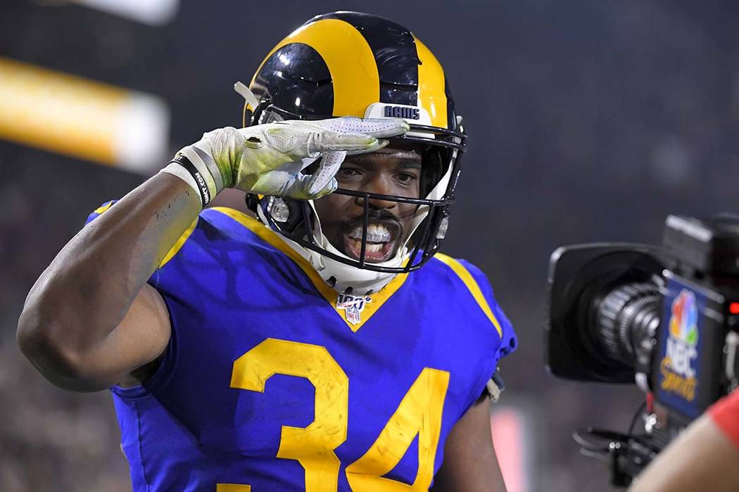 Los Angeles Rams running back Malcolm Brown celebrates after scoring against the Chicago Bears ...