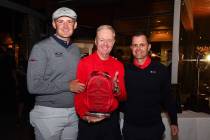 Harry Hall (left) accepted the Earl E. Wilson MVP award for the 2018-19 season from head coach ...