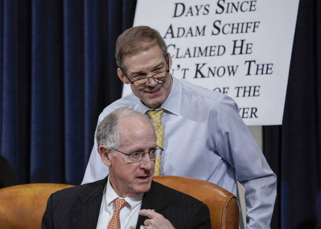 Rep. Jim Jordan, R-Ohio, top, and Rep. Mike Conaway, R-Texas, members of the House Intelligence ...