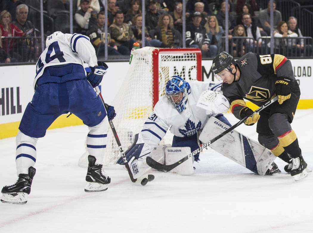 Vegas Golden Knights center Jonathan Marchessault (81) shoots on Toronto Maple Leafs goaltender ...