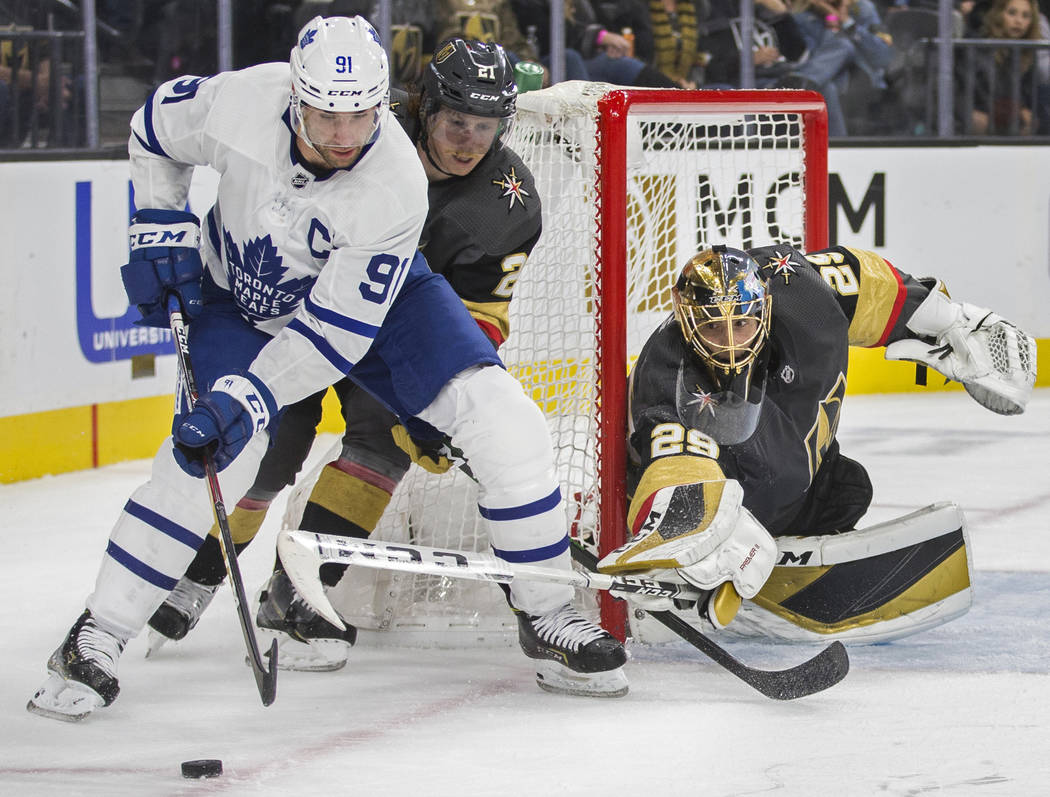 Vegas Golden Knights goaltender Marc-Andre Fleury (29) makes a poke save against Toronto Maple ...