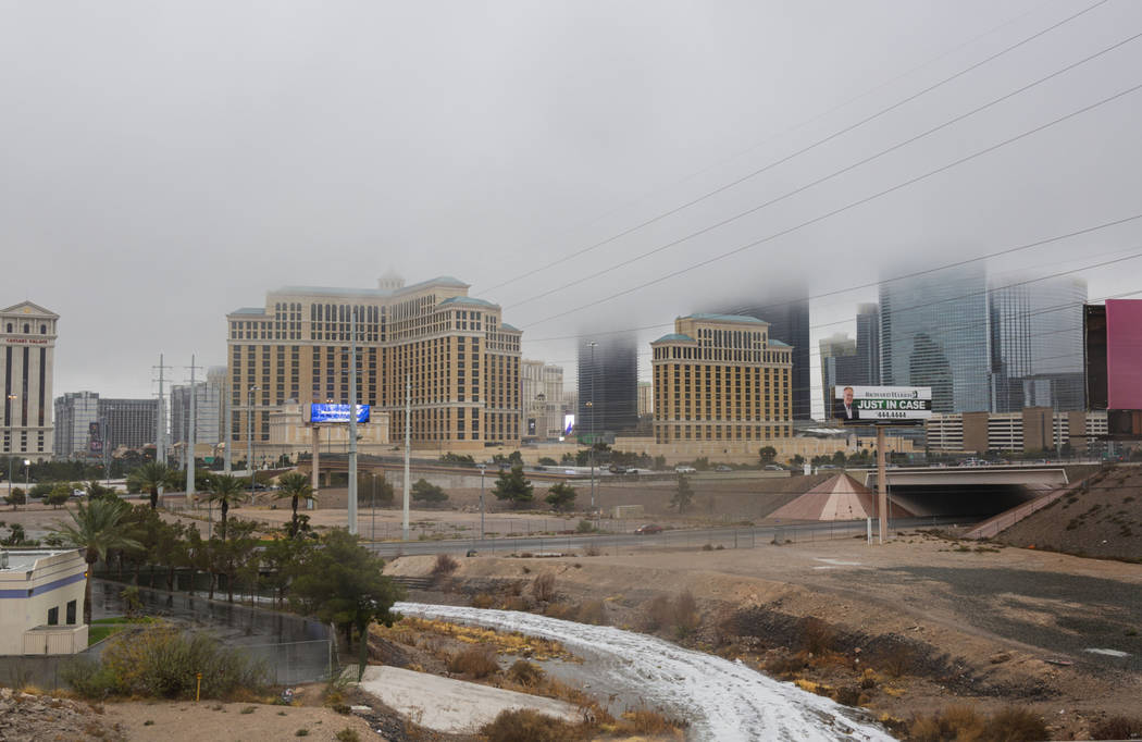 Flood water flows near the Strip in Las Vegas on Wednesday Nov. 20, 2019. (Elizabeth Page Bruml ...