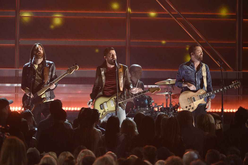 Geoff Sprung, from left, Matthew Ramsey, and Brad Tursi, of Old Dominion, perform "No Such ...