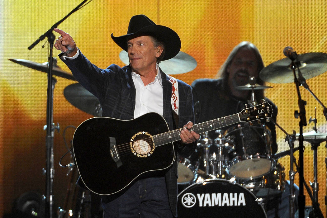 George Strait performs on stage at the 49th annual Academy of Country Music Awards at the MGM G ...