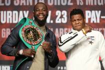 Deontay Wilder, left, and Luis Ortiz, pose during a press conference at the MGM Grand Garden Ar ...