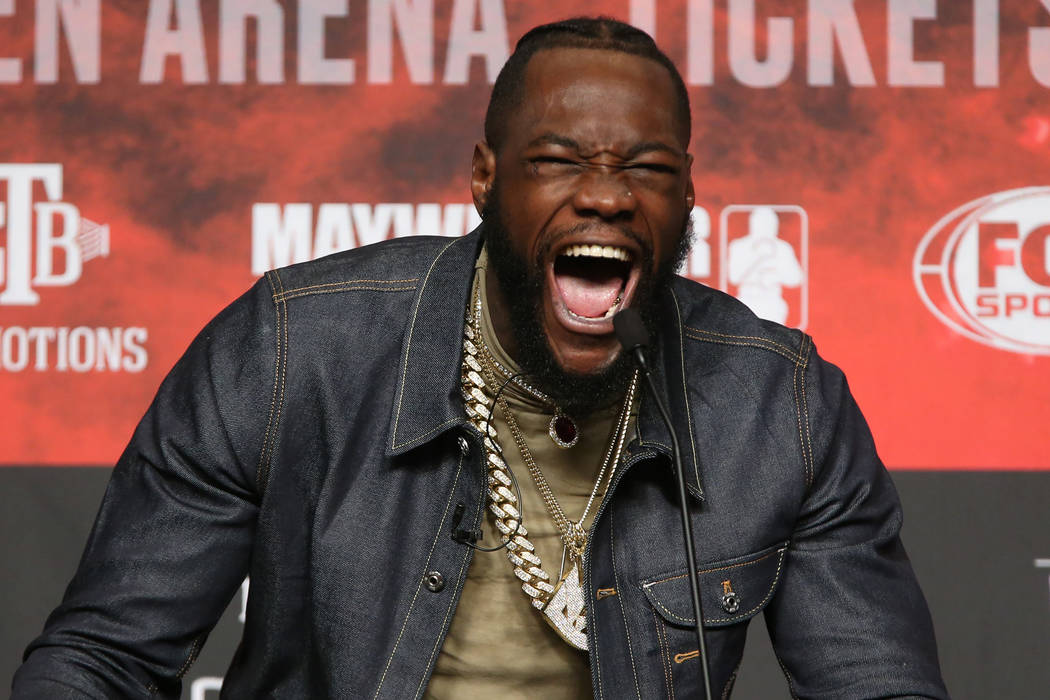 Deontay Wilder yells Bomb Squad during a press conference at the MGM Grand Garden Arena in Las ...