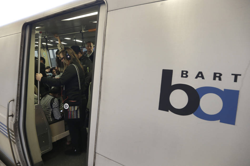 FILE - In this Oct. 22, 2013, file photo, Bay Area Rapid Transit passengers wait for a BART tra ...