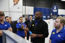 Computer supervisor T.J. Beverly leads employees during a training in preparation of Black Frid ...