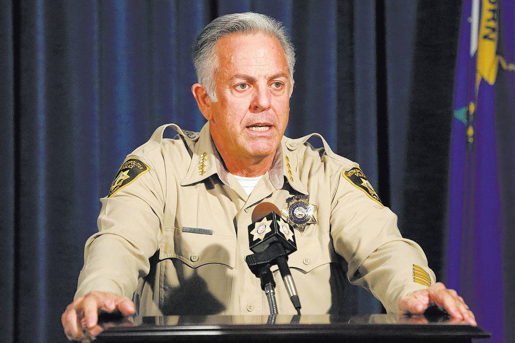Sheriff Joe Lombardo answers questions during a press conference to announce the release of the ...
