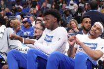 Memphis' James Wiseman, second from right, sits out the game along with Isaiah Stokes, right, i ...