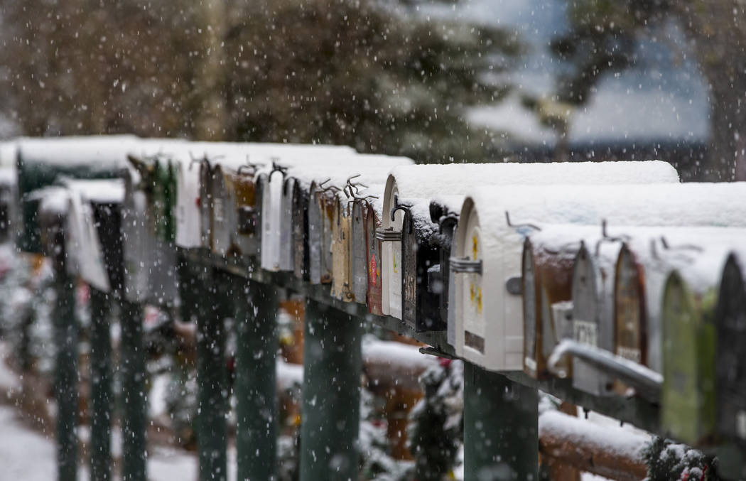 Snow covers mailboxes in Old Town at Mount Charleston on Wednesday, Nov. 20, 2019. Lee Canyon r ...