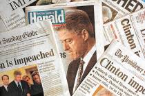 This is a photo montage showing the Sunday, Dec. 20, 1998 editions of newspapers from Massachus ...