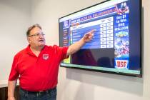 US Fantasy president Vic Salerno explains the function of a video display board showing current ...
