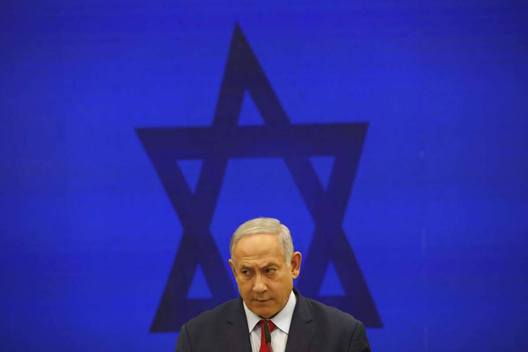 More turmoil for Israel as Netanyahu charged in corruption cases