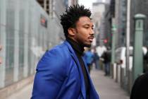 Cleveland Browns star defensive end Myles Garrett leaves an office building in New York, Wednes ...