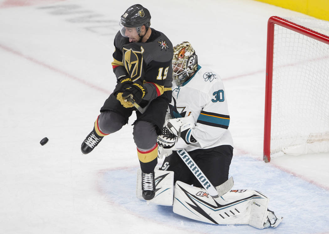 Vegas Golden Knights right wing Reilly Smith (19) jumps to try and deflect a puck past San Jose ...