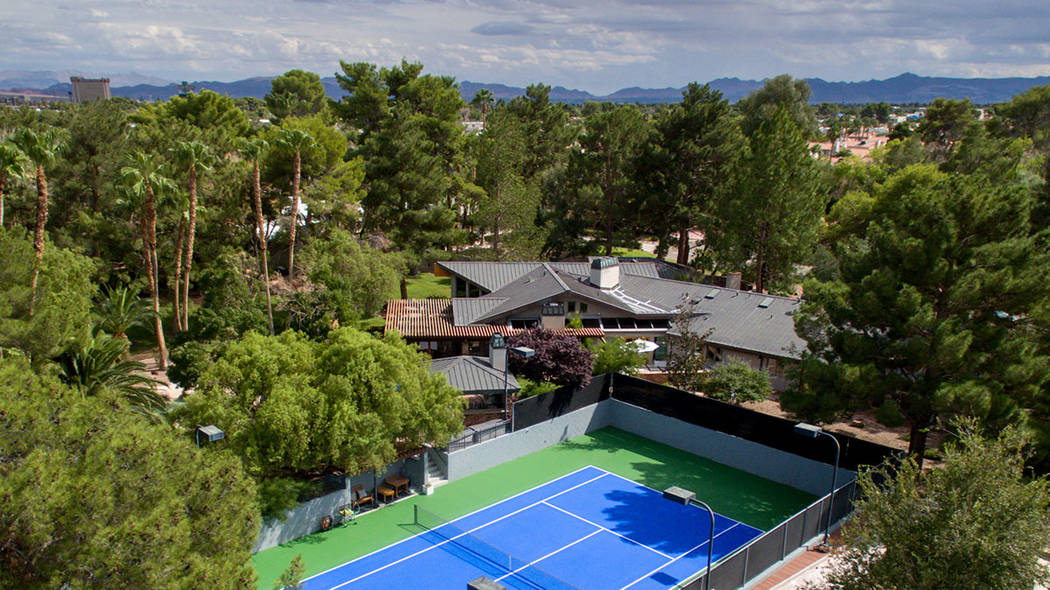 A two-home historical compound in the historic Winchester District features a tennis court. (Si ...