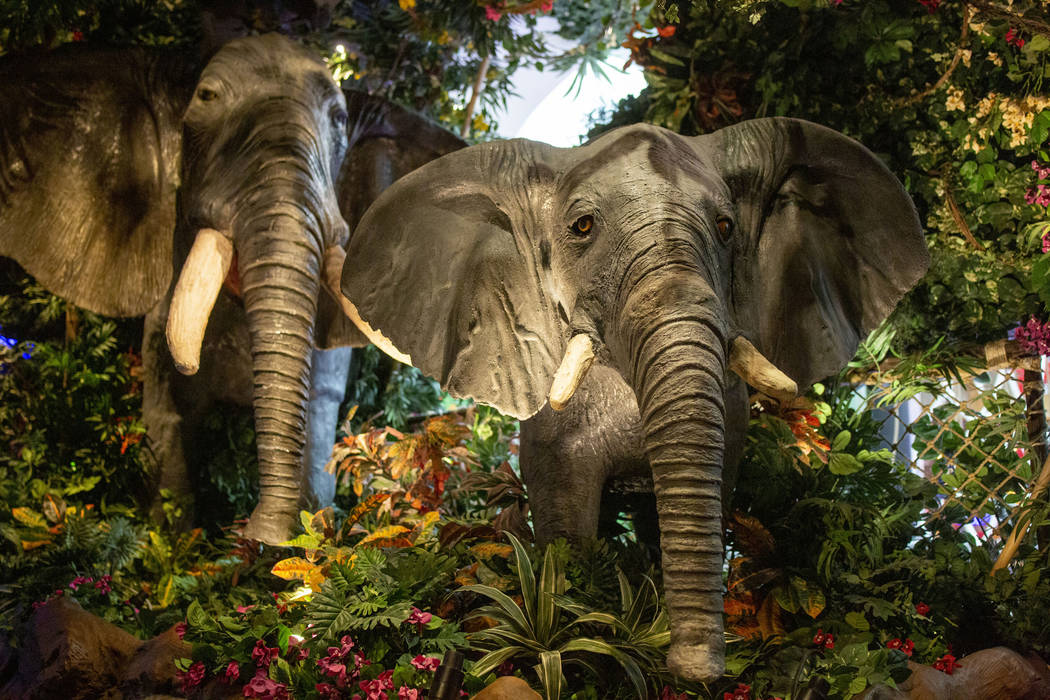 Mechanical elephants act as decoration in the Rainforest Cafe in the Miracle Mile Shops on the ...