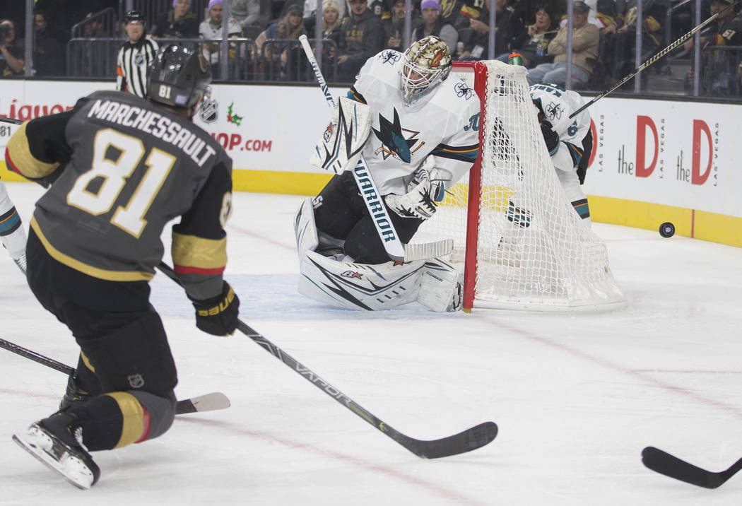 Vegas Golden Knights center Jonathan Marchessault (81) shoots on San Jose Sharks goaltender Aar ...