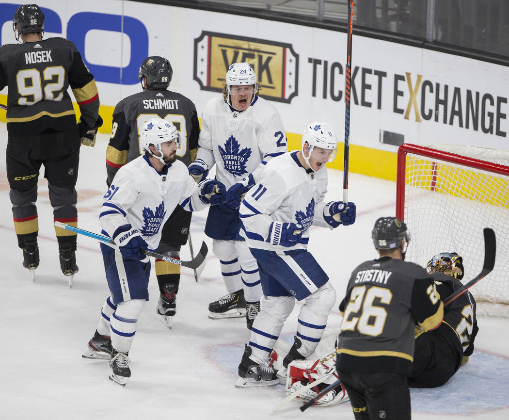 Toronto Maple Leafs center Zach Hyman (11) celebrates with Toronto Maple Leafs center Nic Petan ...