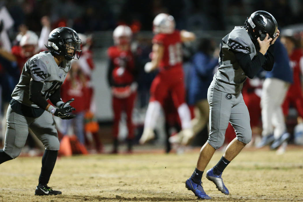 Bishop Gorman Dylan Hamika (43) reacts after missing a field goal in overtime, with Gabe Howe ( ...