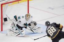 Vegas Golden Knights defenseman Nate Schmidt (88) shoots on San Jose Sharks goaltender Aaron De ...