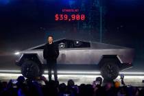 Tesla CEO Elon Musk introduces the Cybertruck at Tesla's design studio Thursday, Nov. 21, 2019, ...