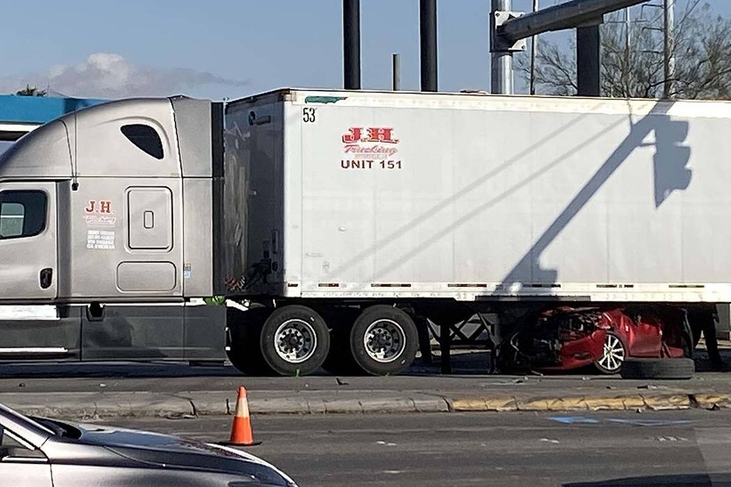 A driver was killed in a crash involving his car and a semitrailer at Losee Road and Cheyenne A ...