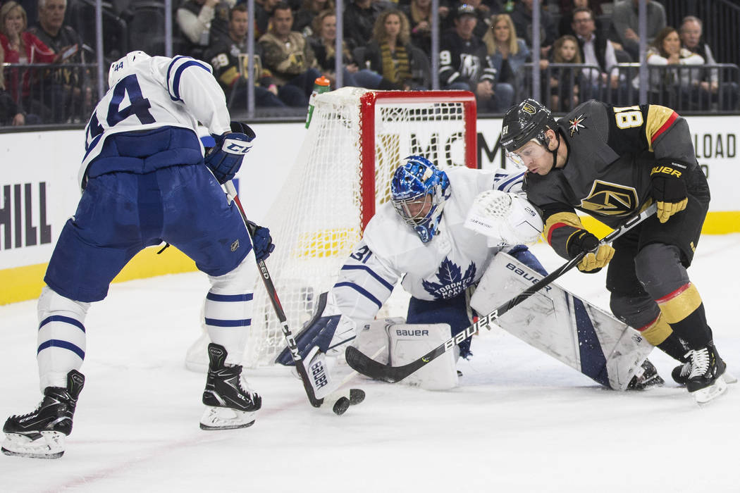 Vegas Golden Knights center Jonathan Marchessault (81) shoots on Toronto Maple Leafs goaltender ...