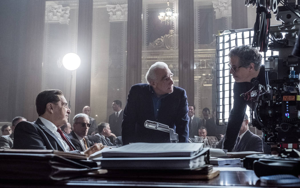Martin Scorsese with Al Pacino, left, and cinematographer Rodrigo Prieto, right, on the set of ...