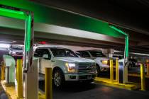 Guests pay for parking at the Caesars Palace garage on Thursday, May 16, 2019, in Las Vegas. (L ...