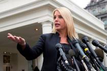 Florida Attorney General Pam Bondi speaks to reporters outside the West Wing of the White House ...