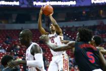 UNLV's Bryce Hamilton (13) shoots against Southern Methodist during the first half of a basketb ...