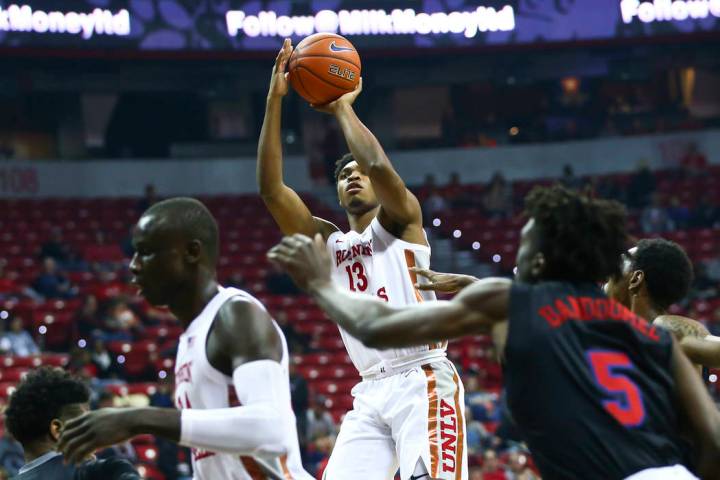UNLV's Bryce Hamilton (13) shoots against Southern Methodist during the first half of a basketb ...